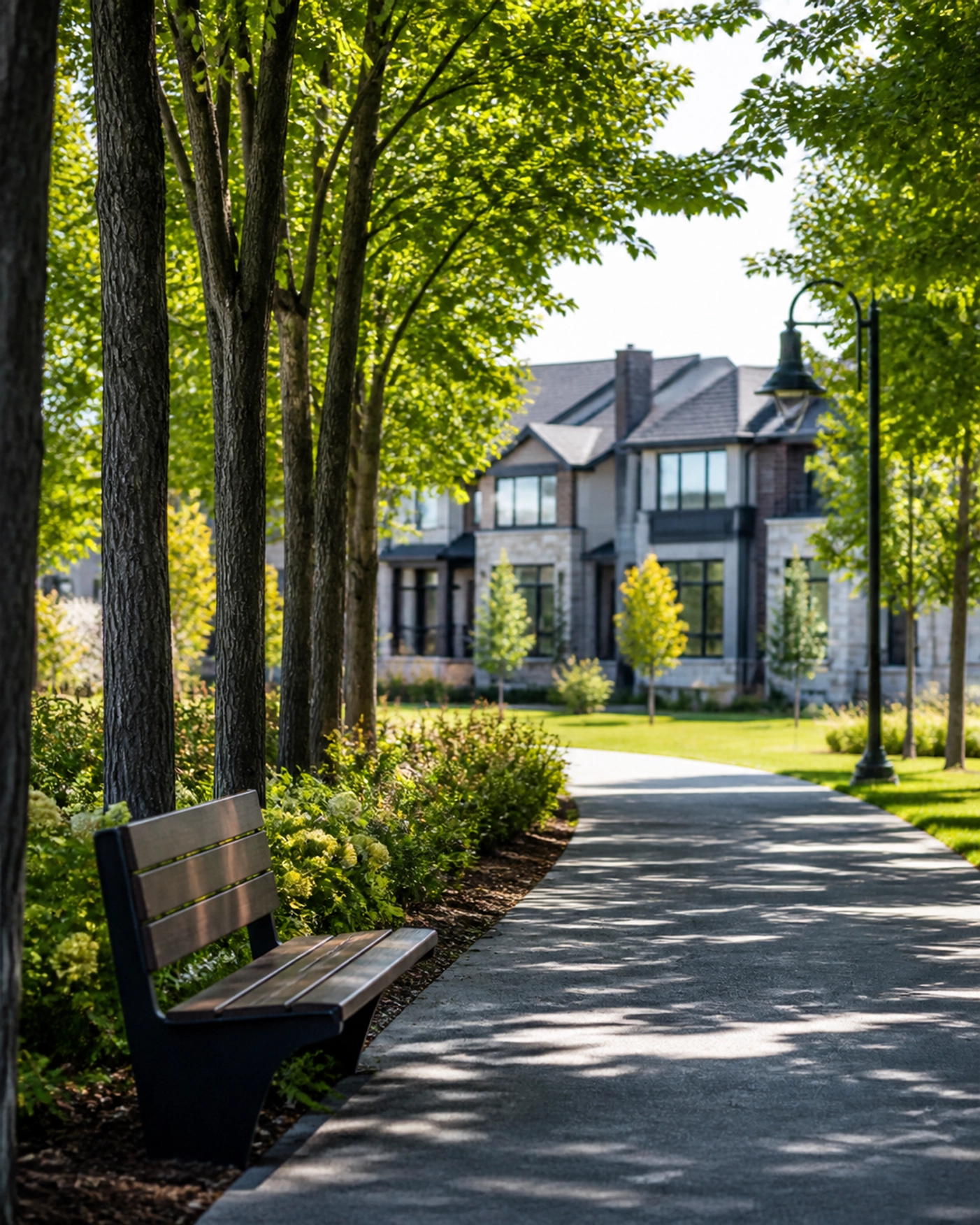 Sun-lit Vaughan park trail near modern family homes, showcasing lifestyle stability for Ontario first-time buyers.